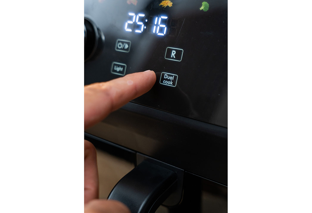 Ζουμ στο κουμπί λειτουργίας Sync